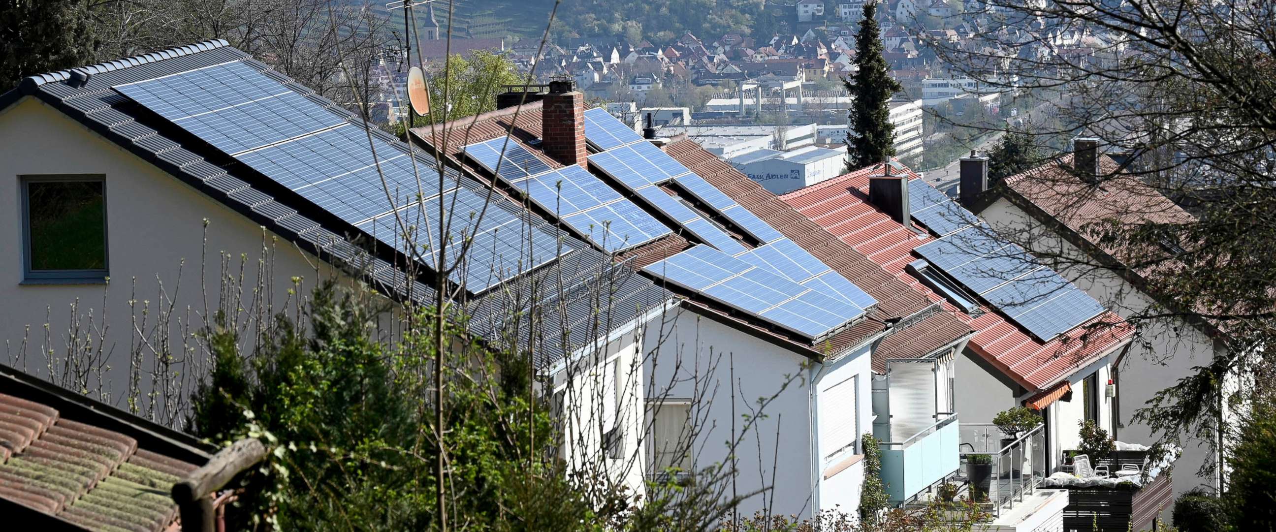 PHOTO: Solar panels are installed on the roofs of houses in Stuttgart, Germany, April 14, 2021.