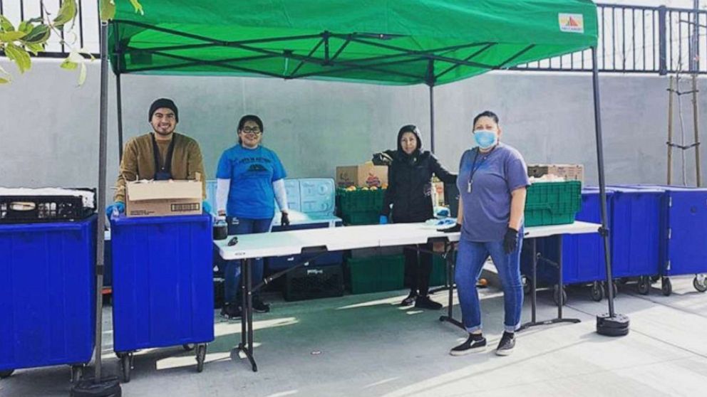 PHOTO: Stephanie Conde and the team at Arts in Action Community Charter Schools after handing out free lunches for pickup.