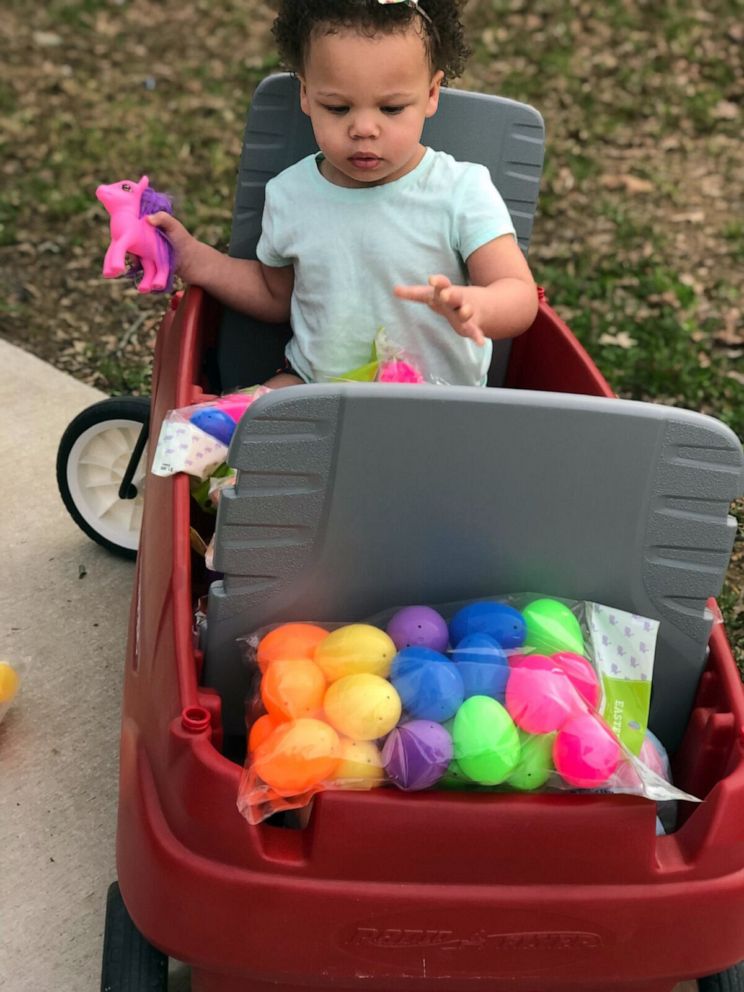 PHOTO: Delaney Drake, 2, is seen with the Easter eggs that her parents, Josh and Blakeley Drake of Manchester, Tenn., will plant in the yards of local families.