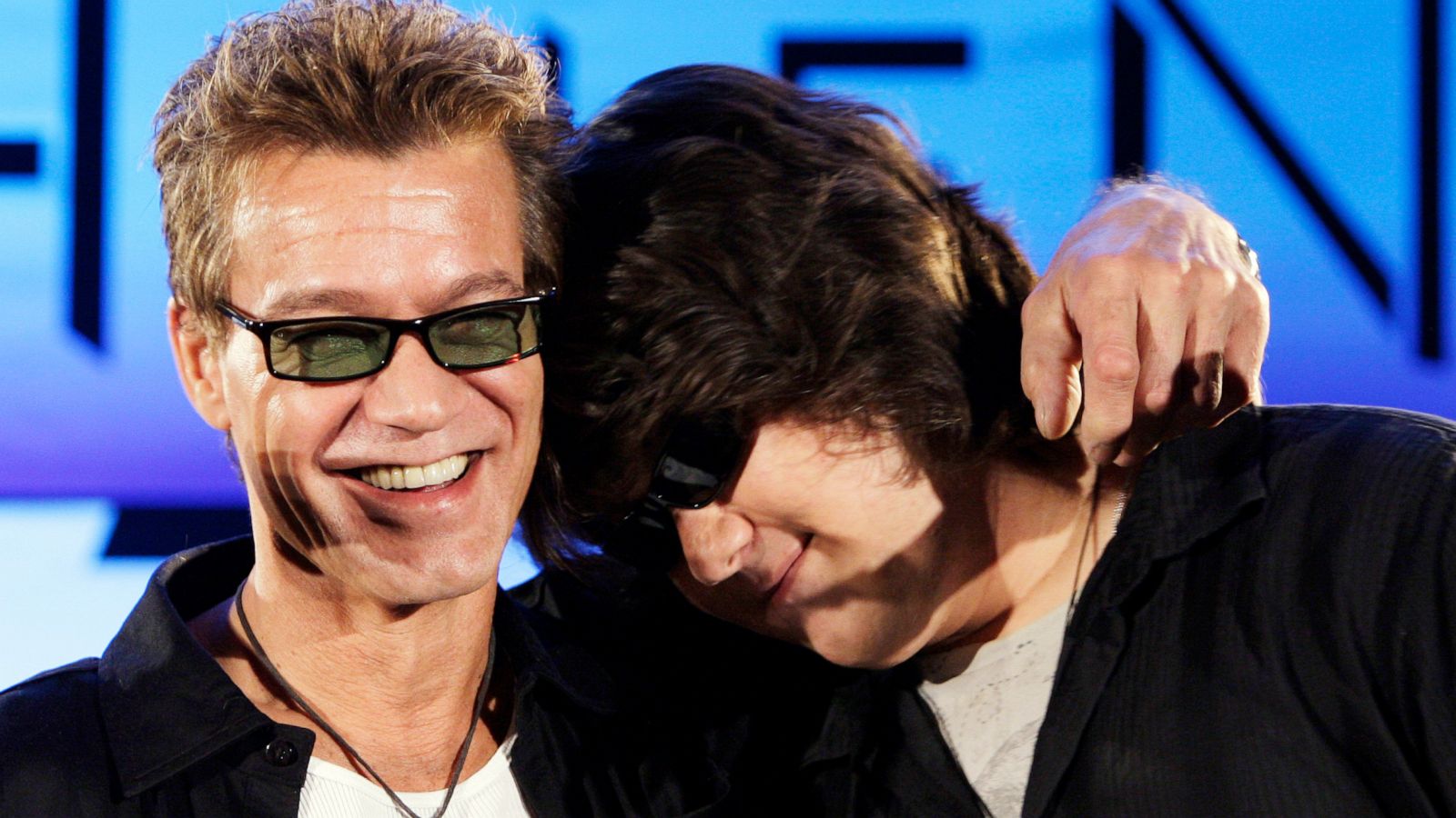 PHOTO: Eddie Van Halen embraces his son Wolfgang Van Halen after the rock group Van Halen officially announced their North American tour during a news conference in Los Angeles on Aug. 13, 2007.