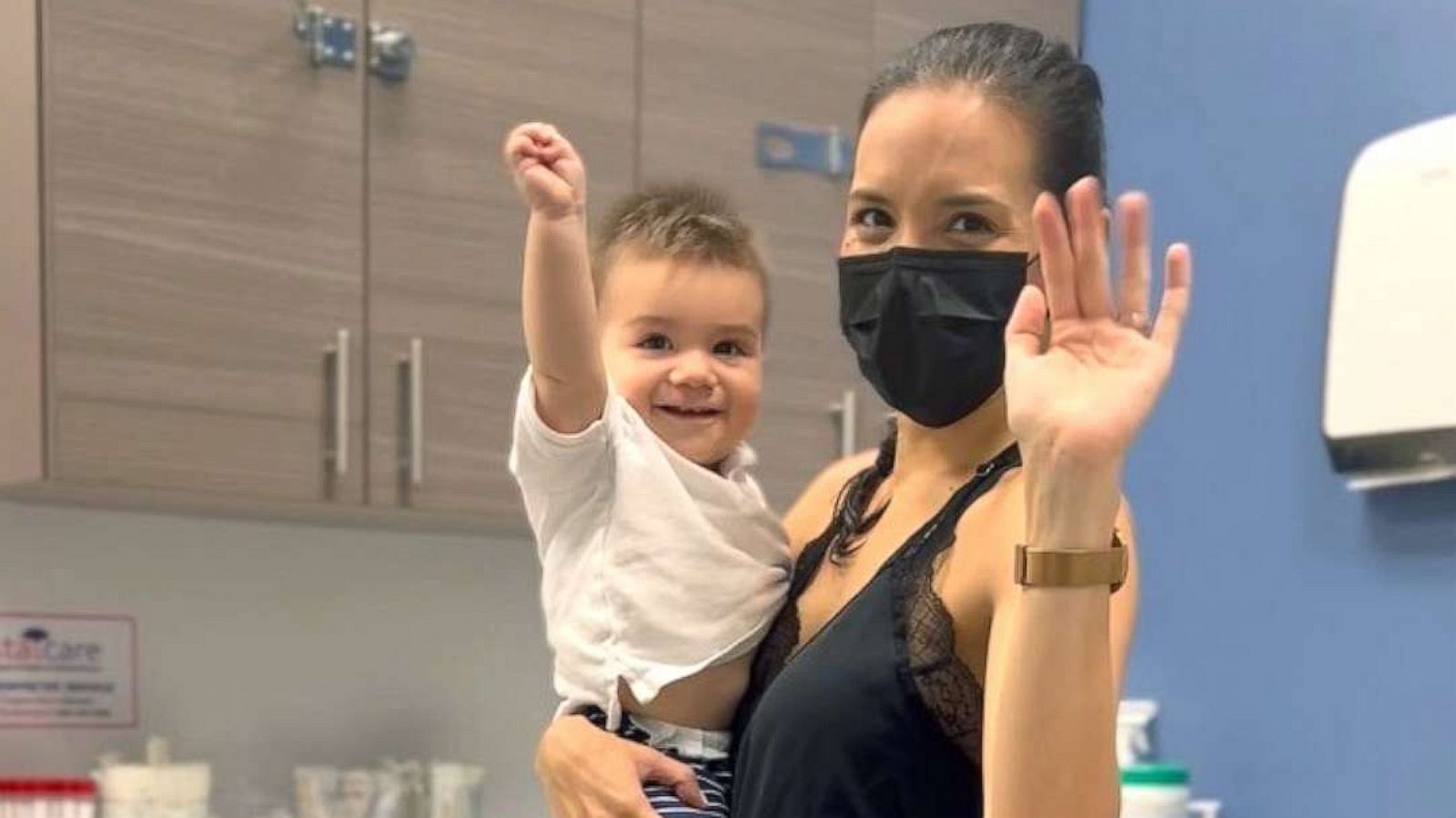 PHOTO: Dr. Edith Bracho-Sanchez holds her son William after he was vaccinated against COVID-19 in August 2022.