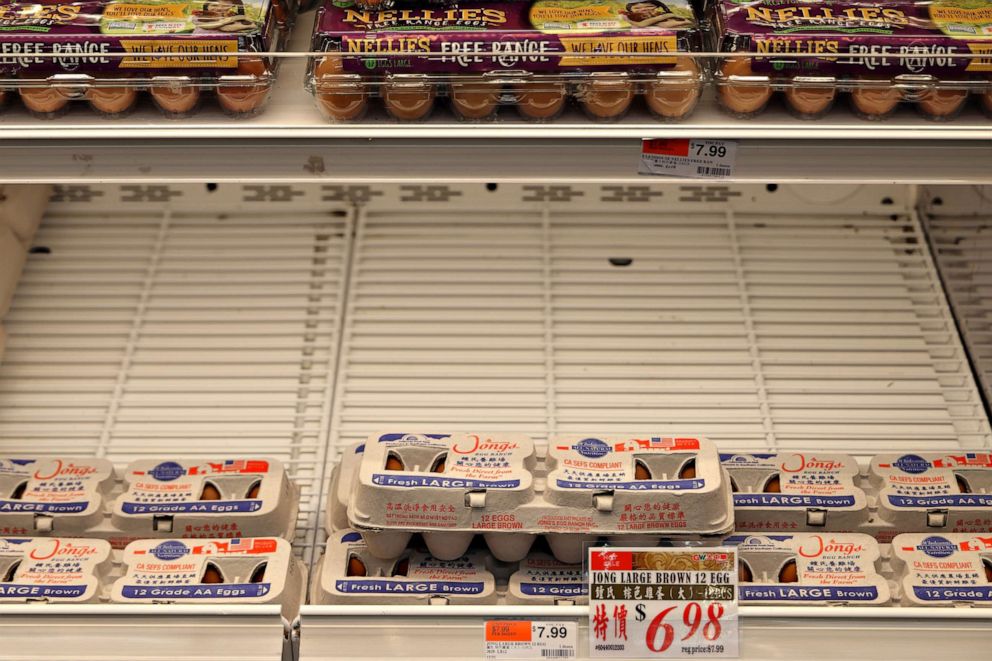 PHOTO: Half-empty shelves of eggs and high prices are seen at a supermarket on Jan. 8, 2023 in Los Angeles.