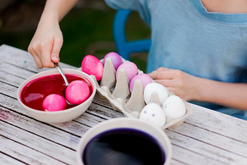 PHOTO: In this undates stock photo, a child is seen dying eggs. 