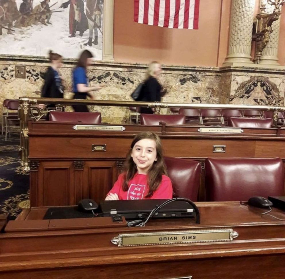 PHOTO: Brooke Petry's daughter, Eleanor, sits in a legislator's chair in the Pennsylvania State Capitol building in Harrisburg.
