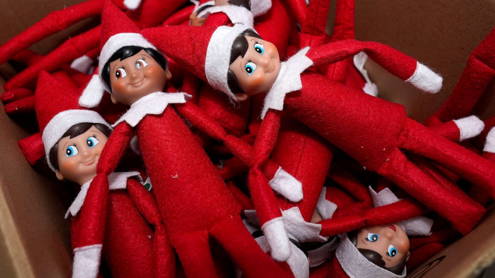 PHOTO: Elf on the Shelf figures are piled in a box at the company's studio, Aug. 27, 2020, in Atlanta.