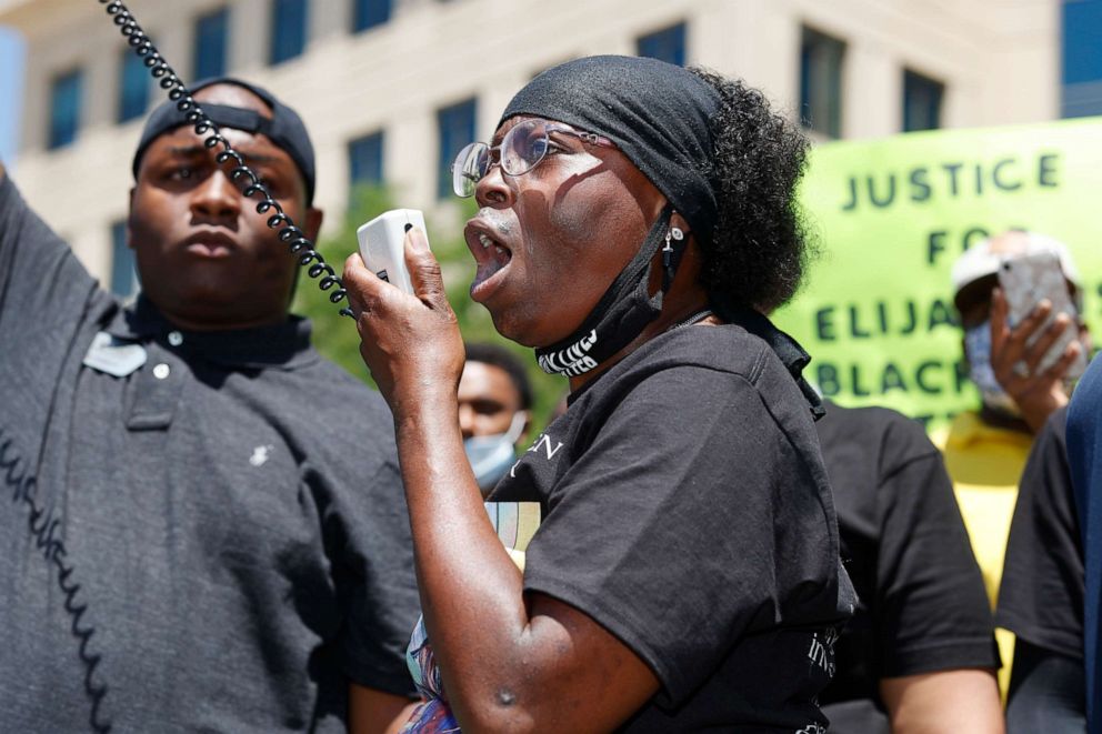 PHOTO: Sheneen McClain speaks during a rally and march over the death of her 23-year-old son, Elijah McClain, outside the police department in Aurora, Colo., June 27, 2020.