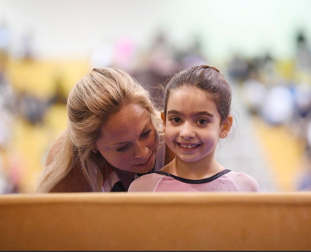 PHOTO: USA Twisterz's Erin Gloor with student Ella Vinitsky is seen in this undated file photo.