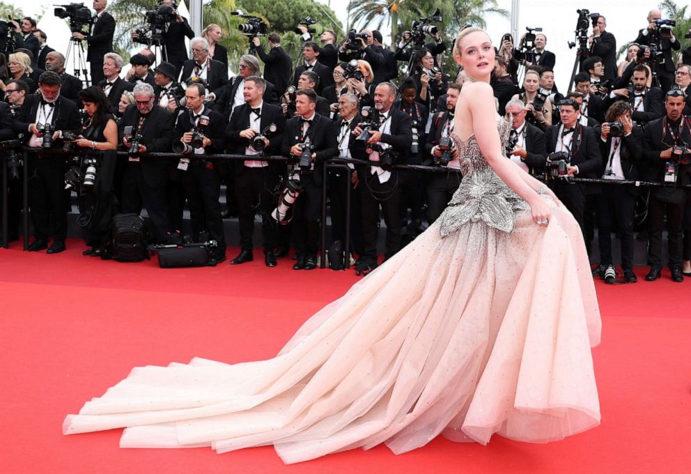 PHOTO: Elle Fanning arrives for the opening ceremony of the 76th edition of the Cannes Film Festival in Cannes, southern France, on May 16, 2023.