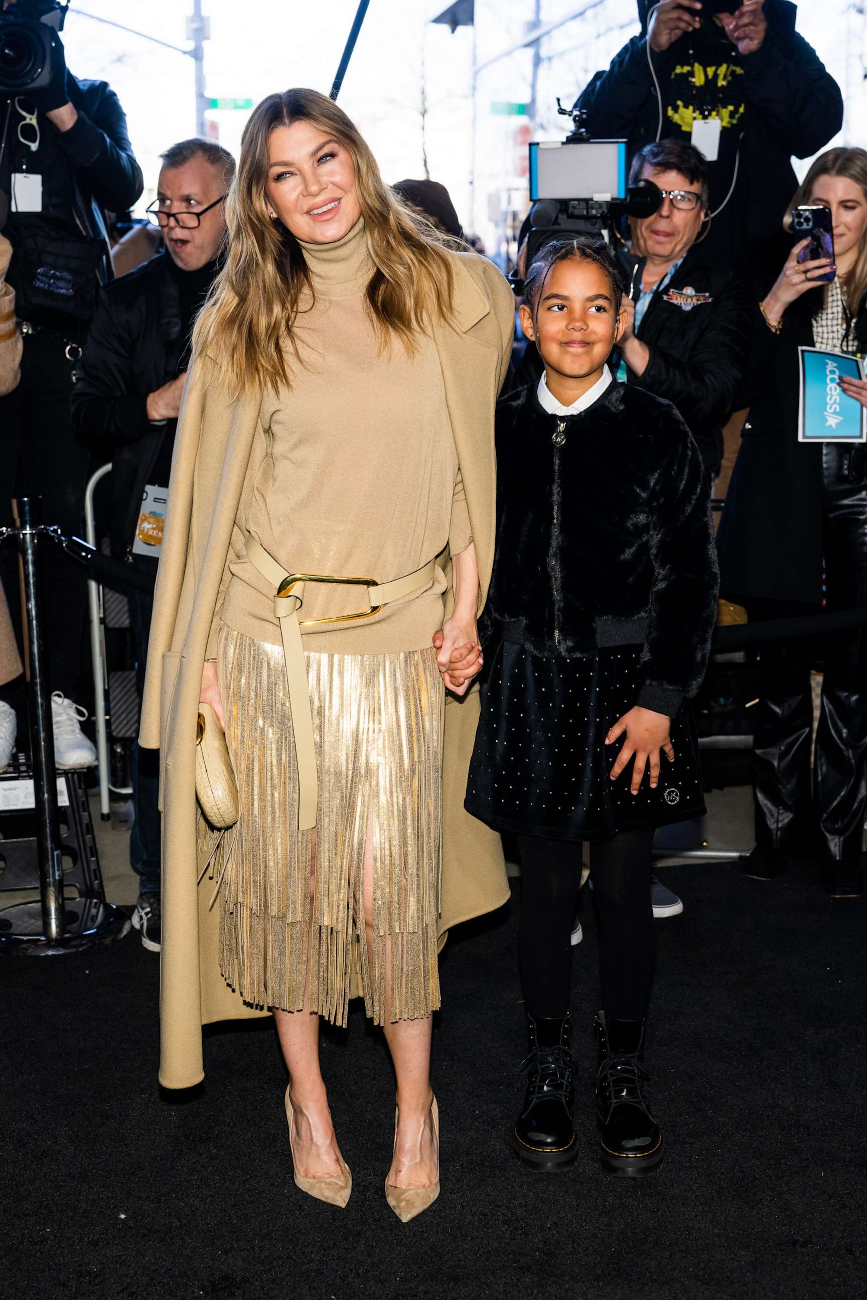 PHOTO: Ellen Pompeo (L) and Sienna Ivery attend the Michael Kors fashion show during New York Fashion Week: The Shows in the Meatpacking District, Feb. 15, 2023, in New York.