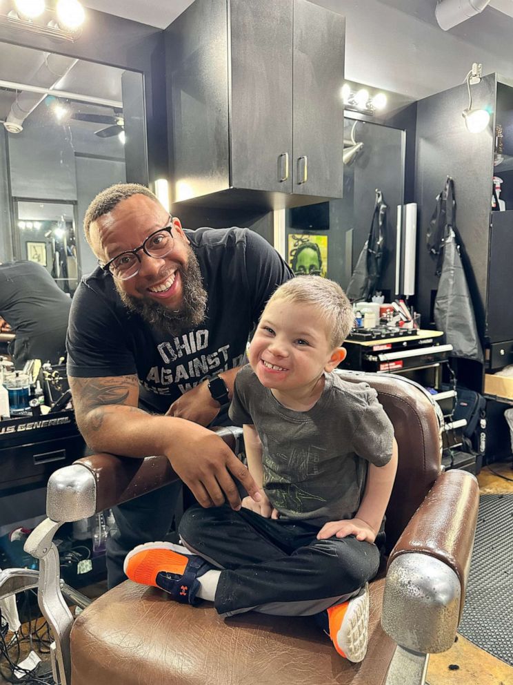 PHOTO: Vernon Jackson and Ellison are all smiles at Jackson's shop, Noble Barber and Beauty in Cincinnati.