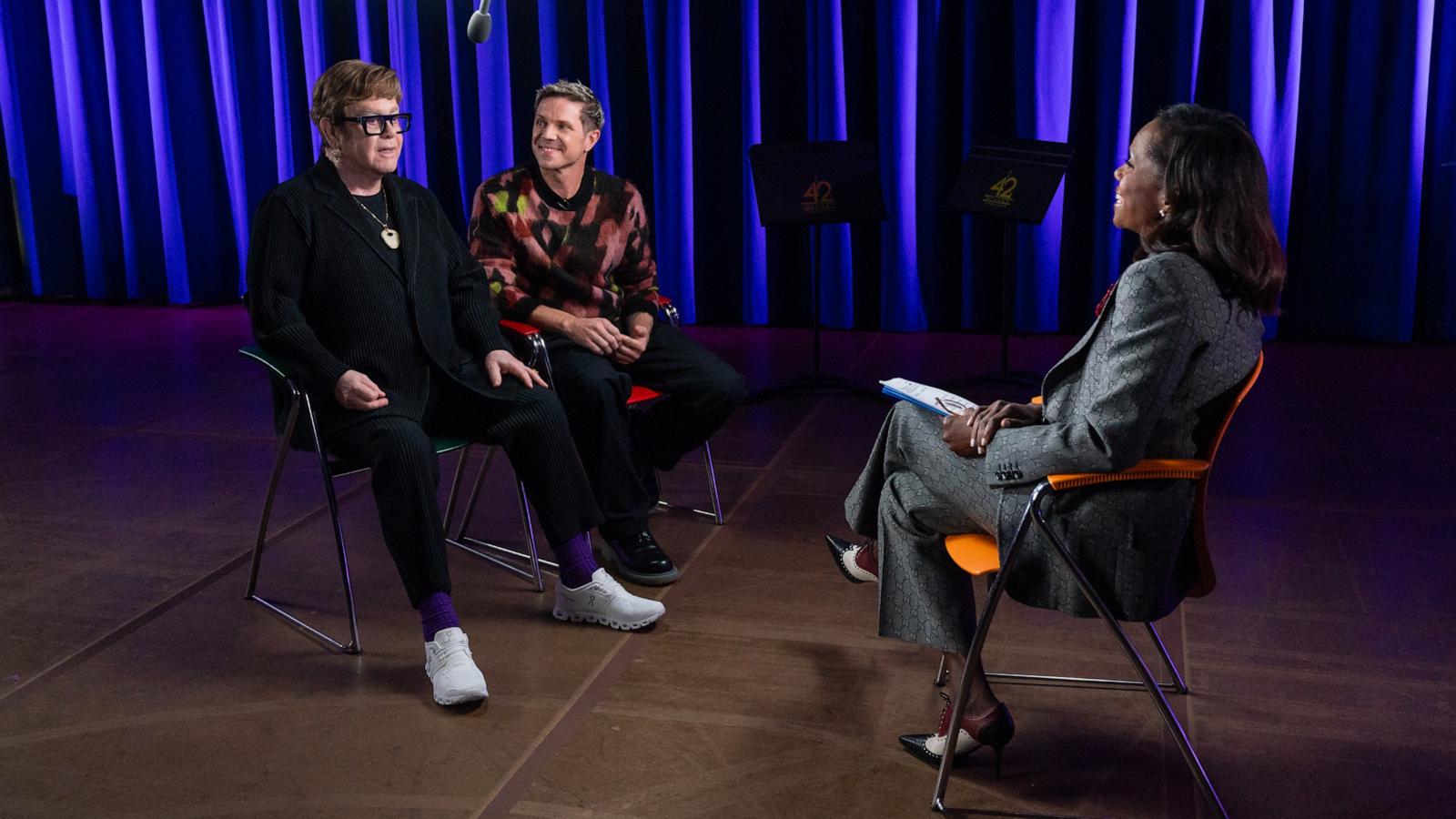 PHOTO: Elton John and Jake Shears appear in this image with ABC News’ Deborah Roberts