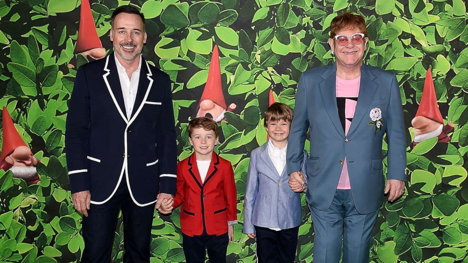 PHOTO: David Furnish and Elton John pose with sons Elijah and Zachary while attending an event at Cineworld Leicester Square on April 22, 2018, in London.