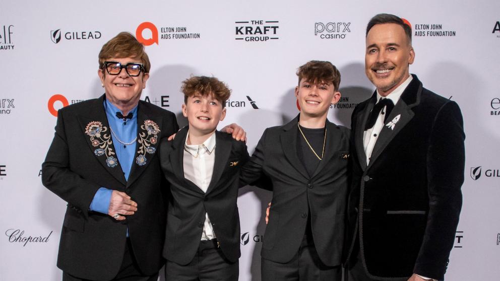 PHOTO: Elton John and his partner David Furnins pose with their sons at the Pacific Design Center in West Hollywood, California, on March 2, 2025.