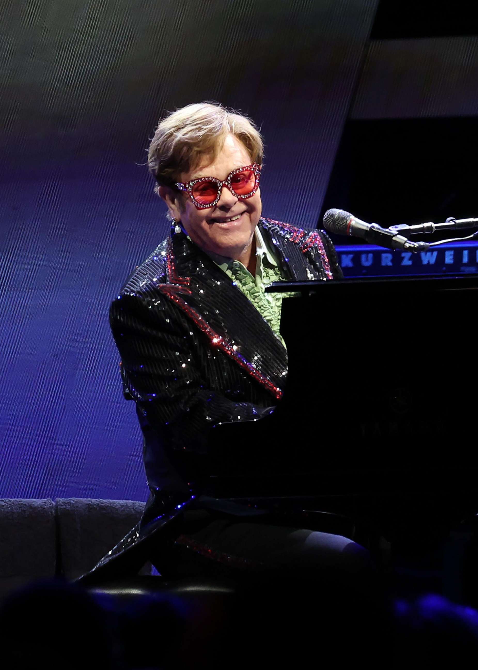 PHOTO: In this April 2, 2023, file photo, Sir Elton John performs live on stage during his "Farewell Yellow Brick Road" Tour in London.
