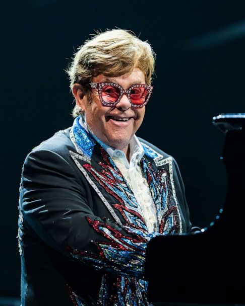 Elton John's top 8 iconic outfits throughout the years