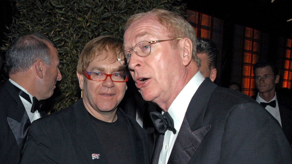 Elton John, Michael Caine comically encourage Brits to get COVID-19 vaccine