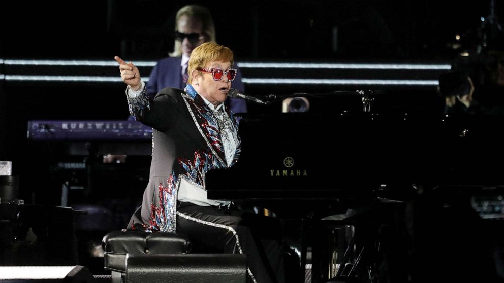 PHOTO: Elton John performs "Bennie and the Jets" as he completes the US leg of his tour 