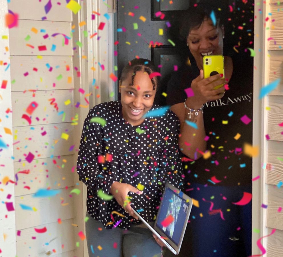 PHOTO: Emani Stanton is showered with confetti after Fleming shows up at her doorstep.