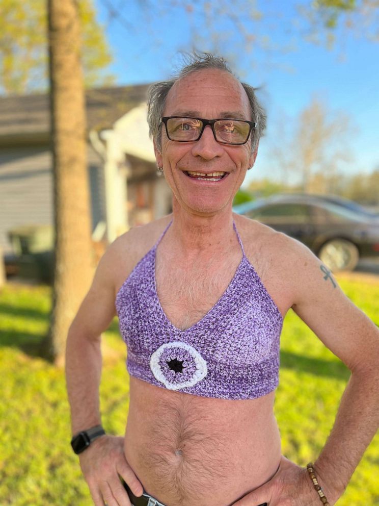 PHOTO: An Arkansas-based crochet artist and content creator Emily Beaver's father, Jeff Beaver, has been winning the internet by modeling her crochet crop tops and more looks.