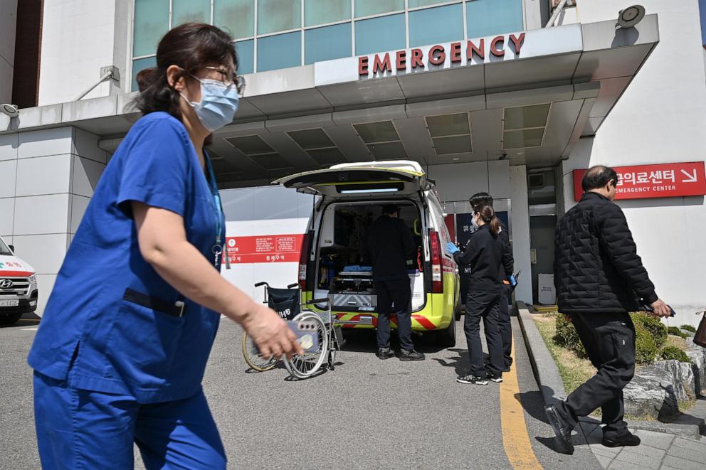 PHOTO: A medical worker walks past an emergency room outside a hospital in Seoul, Apr. 1, 2024. 