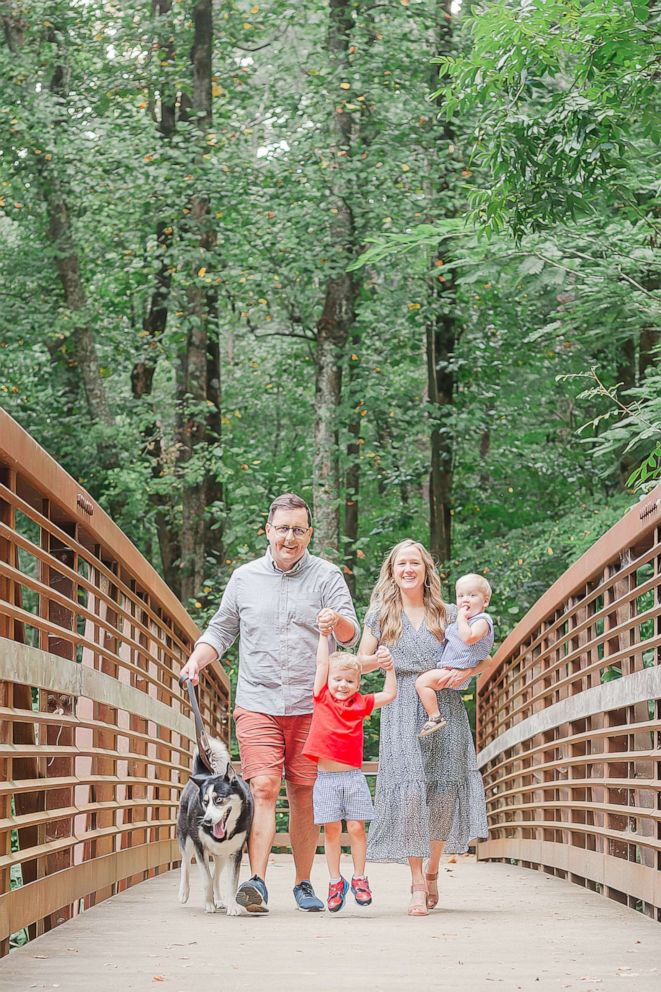 PHOTO: Andrea DeLaney poses with her husband and their two sons, Emerson and Wells, and their family dog.