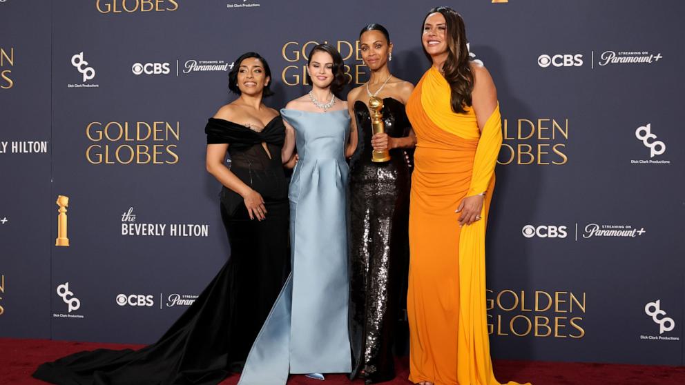 PHOTO: Adriana Paz, Selena Gomez, Zoe Saldana, winner of the award for best performance by a female actor in a supporting role in any motion picture for "Emilia Perez," pose at the 82nd Golden Globes Jan. 5, 2025, in Beverly Hills, Calif. 