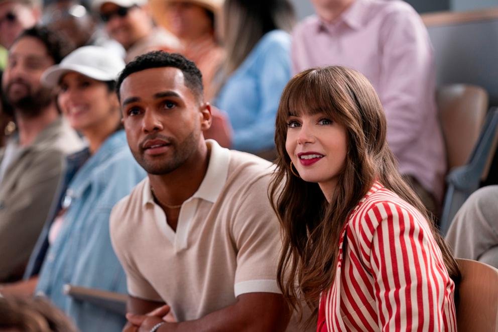 PHOTO: Lucien Laviscount as Alfie, Lily Collins as Emily in "Emily in Paris," 2024.