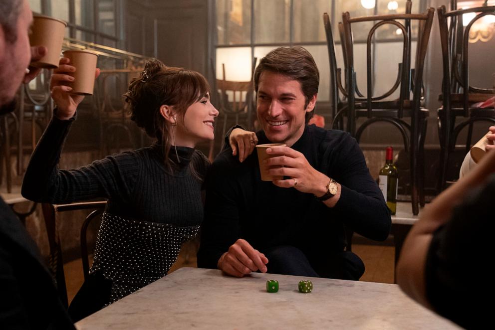 PHOTO: Lily Collins as Emily, Lucas Bravo as Gabriel in "Emily in Paris," 2024.