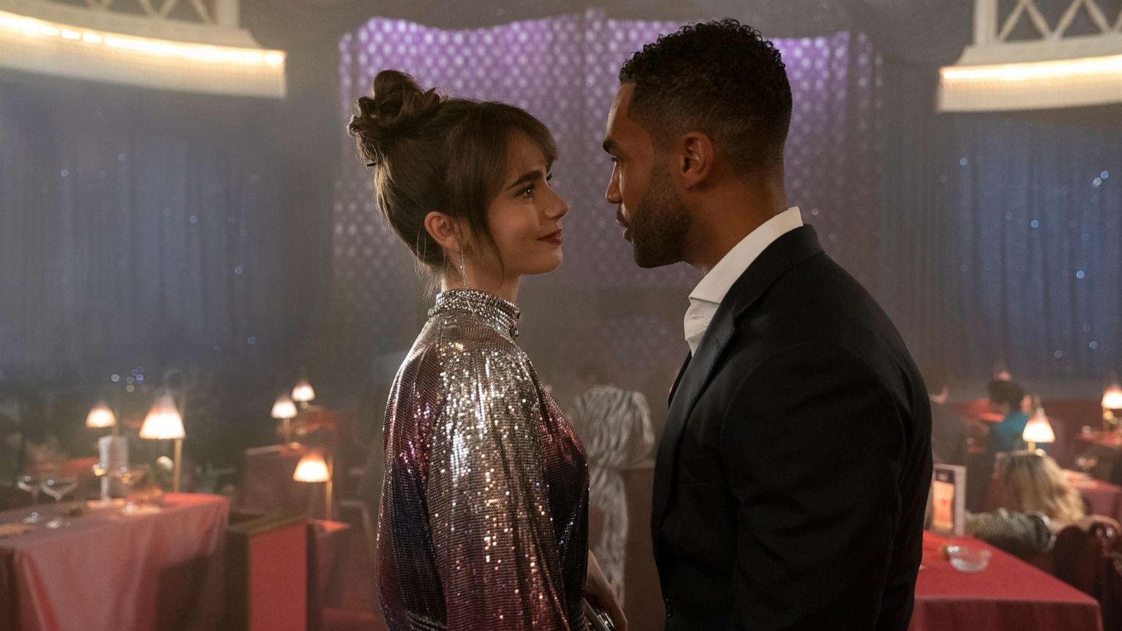 PHOTO: Lucien Laviscount as Alfie and Lily Collins as Emily in a still from "Emily in Paris" season 3.