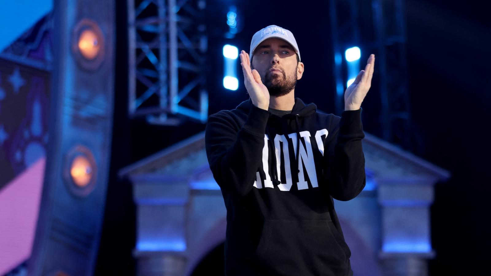 PHOTO: Rapper Marshall "Eminem" Mathers claps during the first round of the 2024 NFL Draft at Campus Martius Park and Hart Plaza on April 25, 2024 in Detroit.