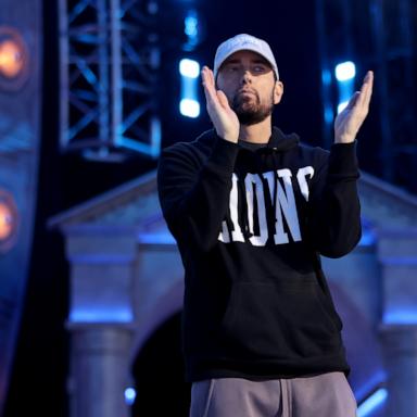 PHOTO: Rapper Marshall "Eminem" Mathers claps during the first round of the 2024 NFL Draft at Campus Martius Park and Hart Plaza on April 25, 2024 in Detroit.