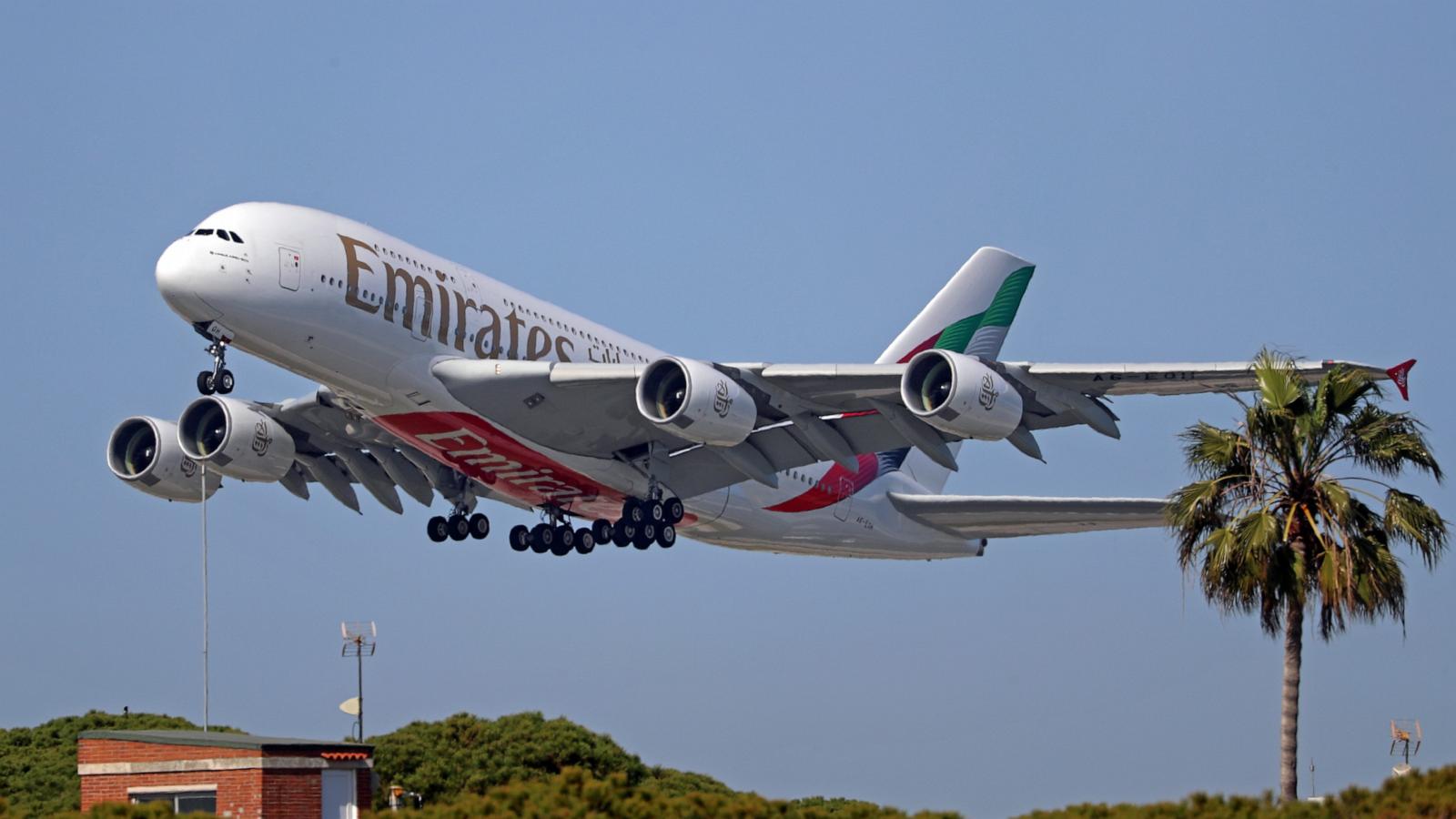 PHOTO: An Emirates Airbus A380-861 with the new livery is taking off from Barcelona-El Prat Airport, April 12, 2024, in Barcelona, Spain.