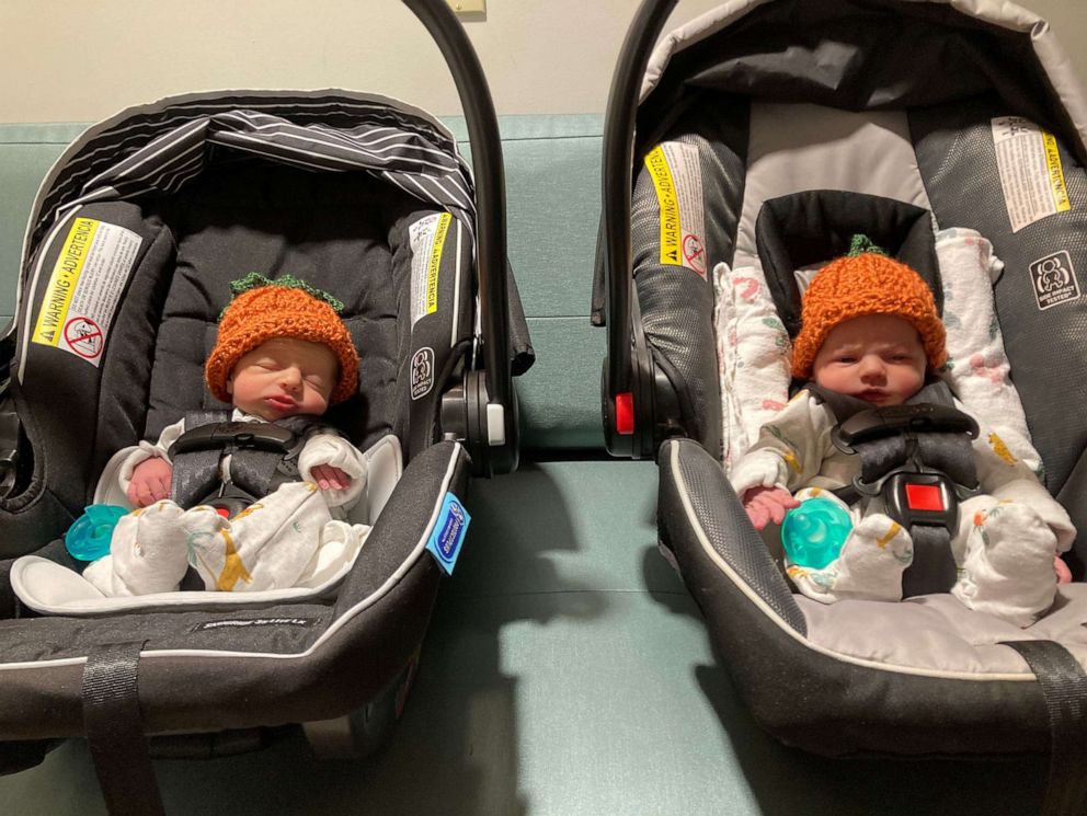 PHOTO: Twins Emma and Julia wore knitted pumpkin hats on their way home from the hospital.
