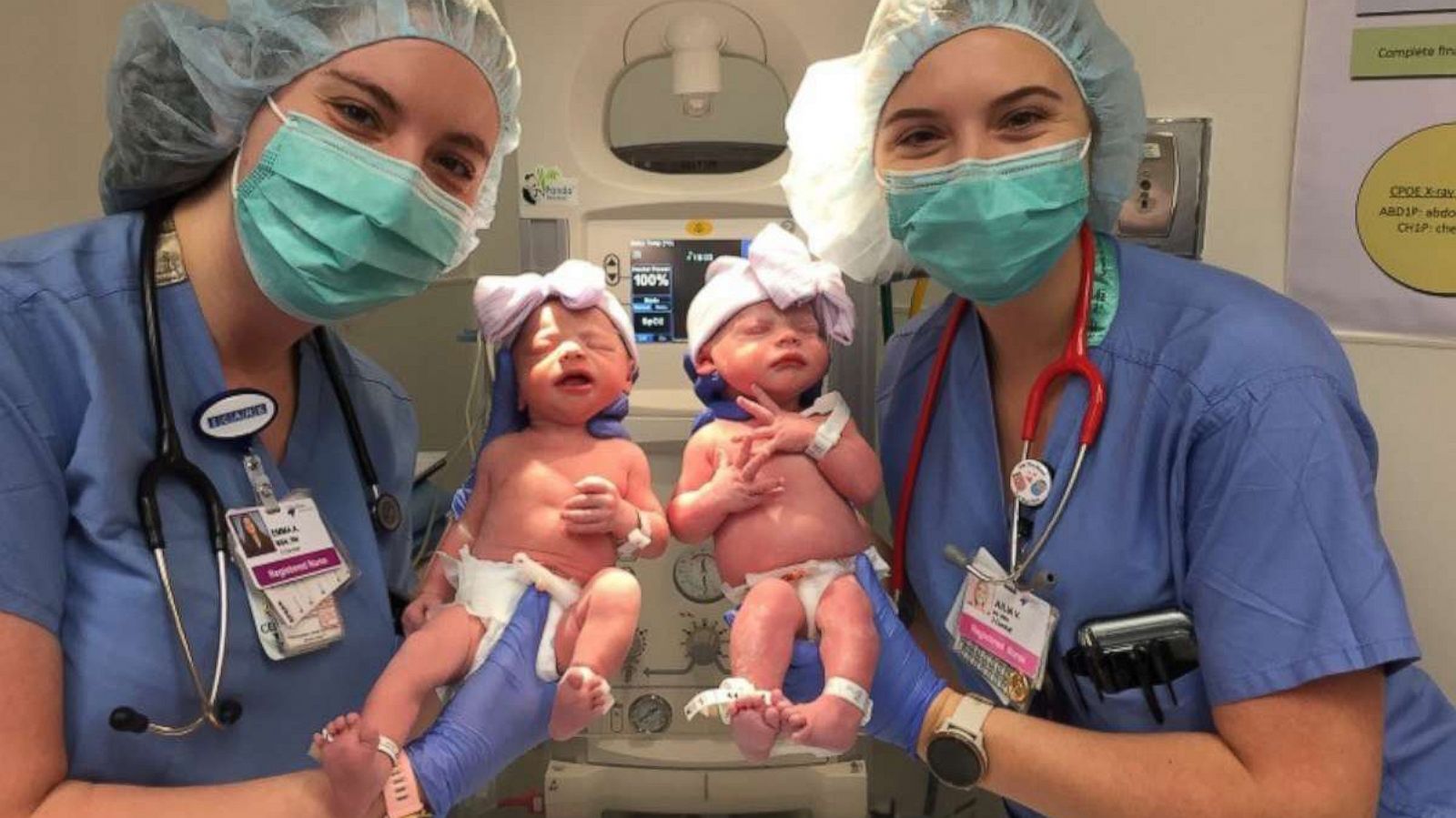 PHOTO: Nurses Emma Anderson and Julia Van Marter hold twins Emma and Julia Meehan. The nurses cared for the twins at HCA Healthcare's Rose Medical Center in Denver.