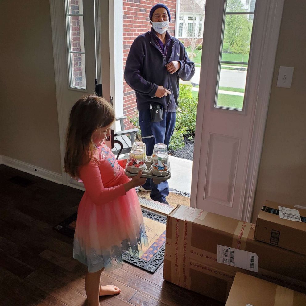 FedEx delivery man surprises little girl with cupcakes to celebrate her birthday