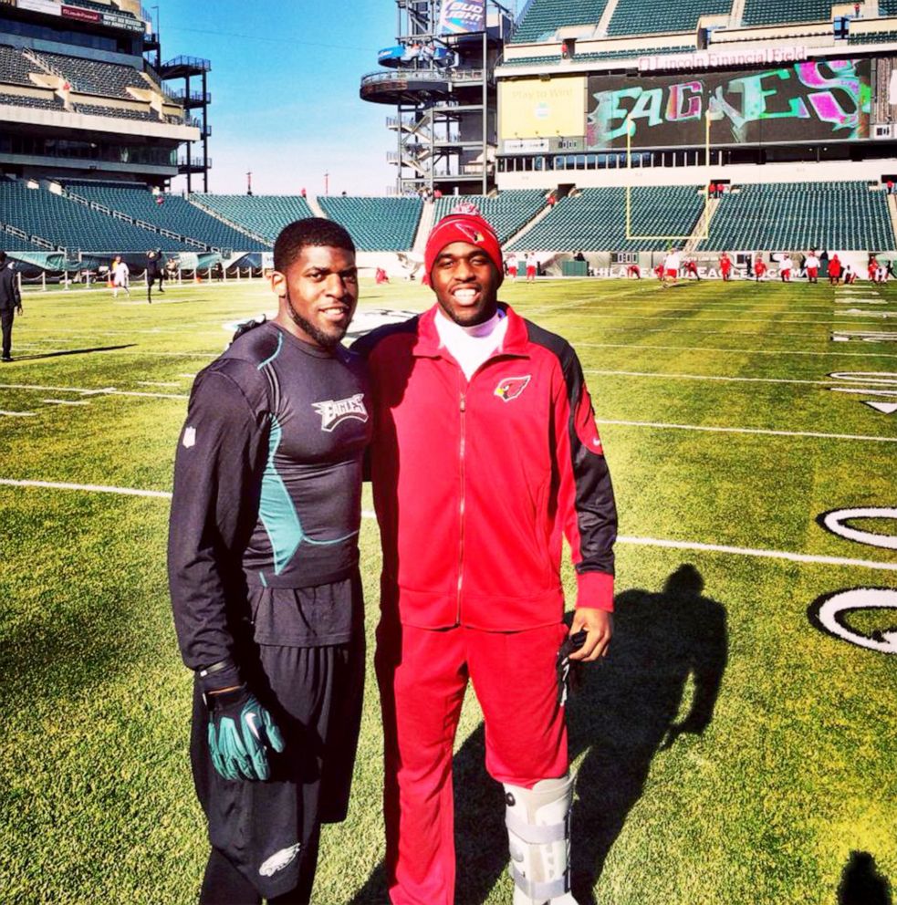 PHOTO: Emmanuel Acho pictured with his brother Sam Acho before a Philadelphia Eagles and Arizona Cardinals football game.