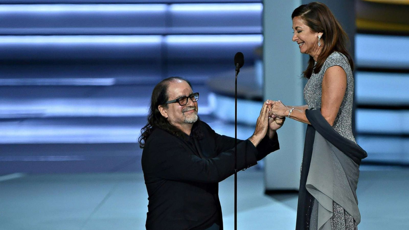 PHOTO: Glenn Weiss, winner of the Outstanding Directing for a Variety Special award for 'The Oscars,' proposes to Jan Svendsen during the 70th Emmy Awards at the Microsoft Theatre in Los Angeles on Sept. 17, 2018.