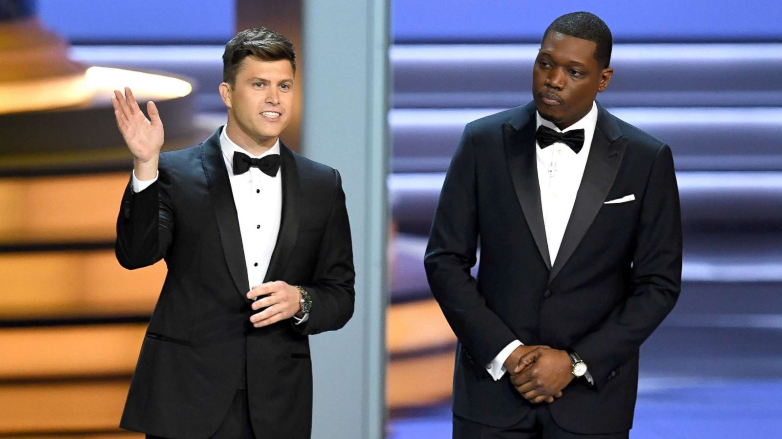 PHOTO: Colin Jost (L) and Michael Che speak onstage during the 70th Emmy Awards at on Sept. 17, 2018, in Los Angeles.