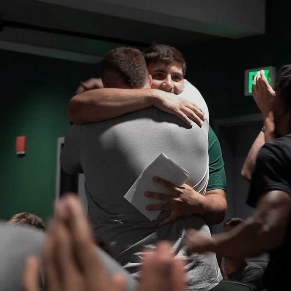 VIDEO: College football player gives scholarship to teammate