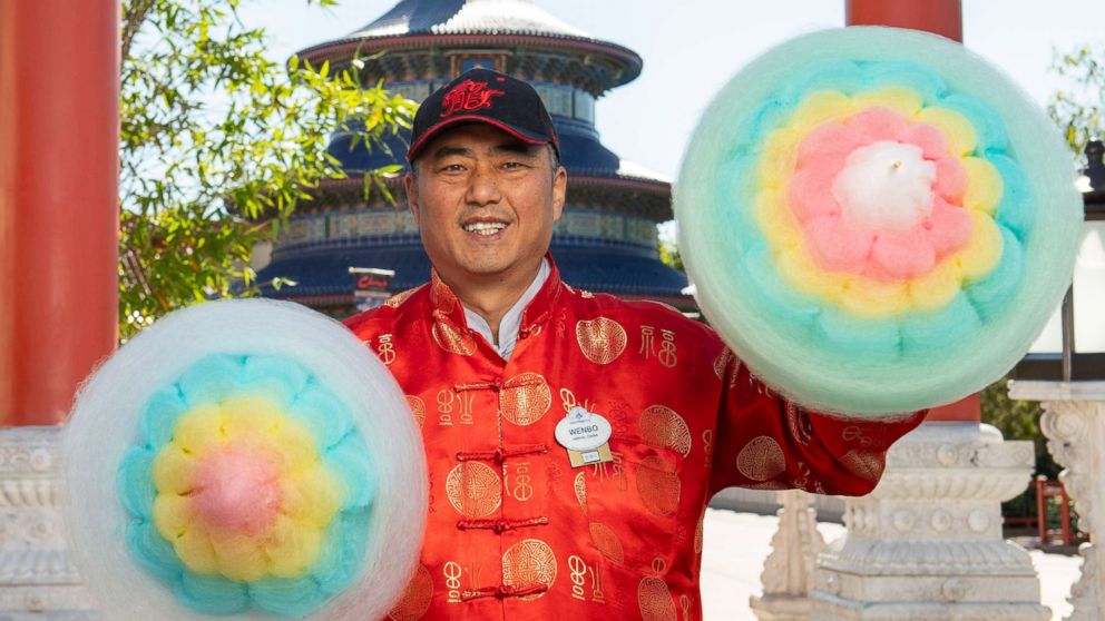 A Disney Chef creates a 5-layer cotton candy treat at Disney World.
