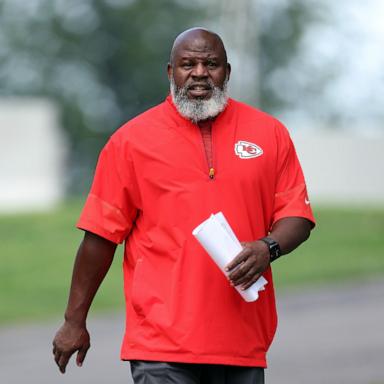 PHOTO: Offensive coordinator Eric Bieniemy walks toward the practice field during Kansas City Chiefs training camp at Missouri Western State University on July 25, 2026 in St Joseph, Missouri.