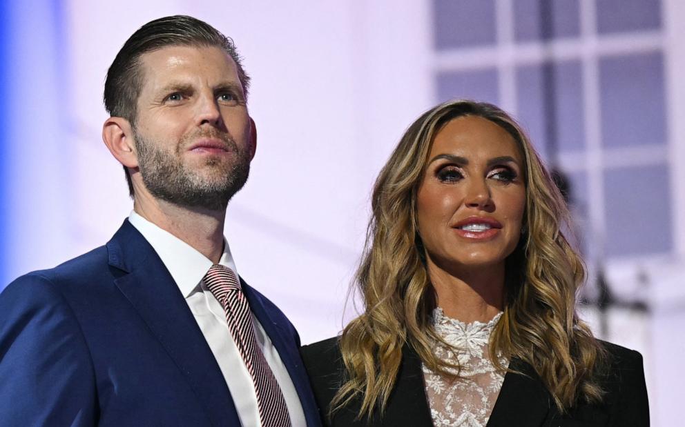 PHOTO: Eric Trump and his wife co-chair of the Republican National Committee Lara Trump stand on stage on the last day of the 2024 Republican National Convention in Milwaukee, July 18, 2024.