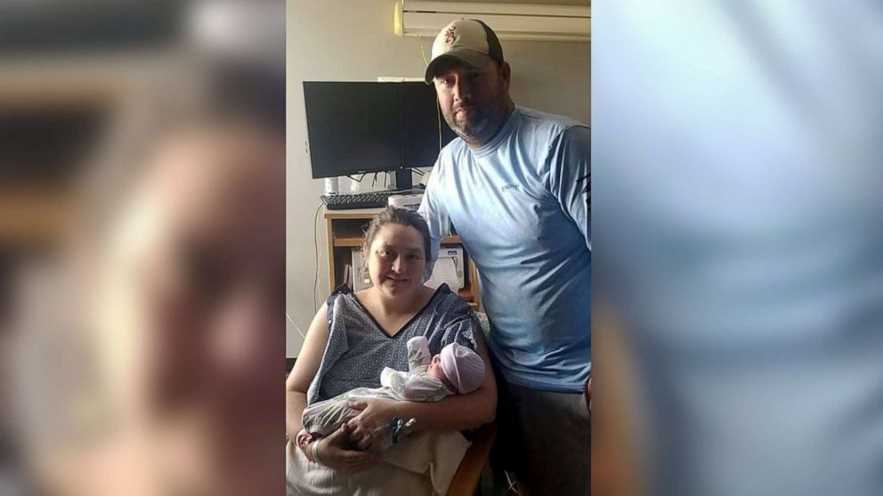 PHOTO: Ross and Angeline Eschette pose with their newborn daughter at Nacogdoches Medical Center, in Nacogdoches, Texas.