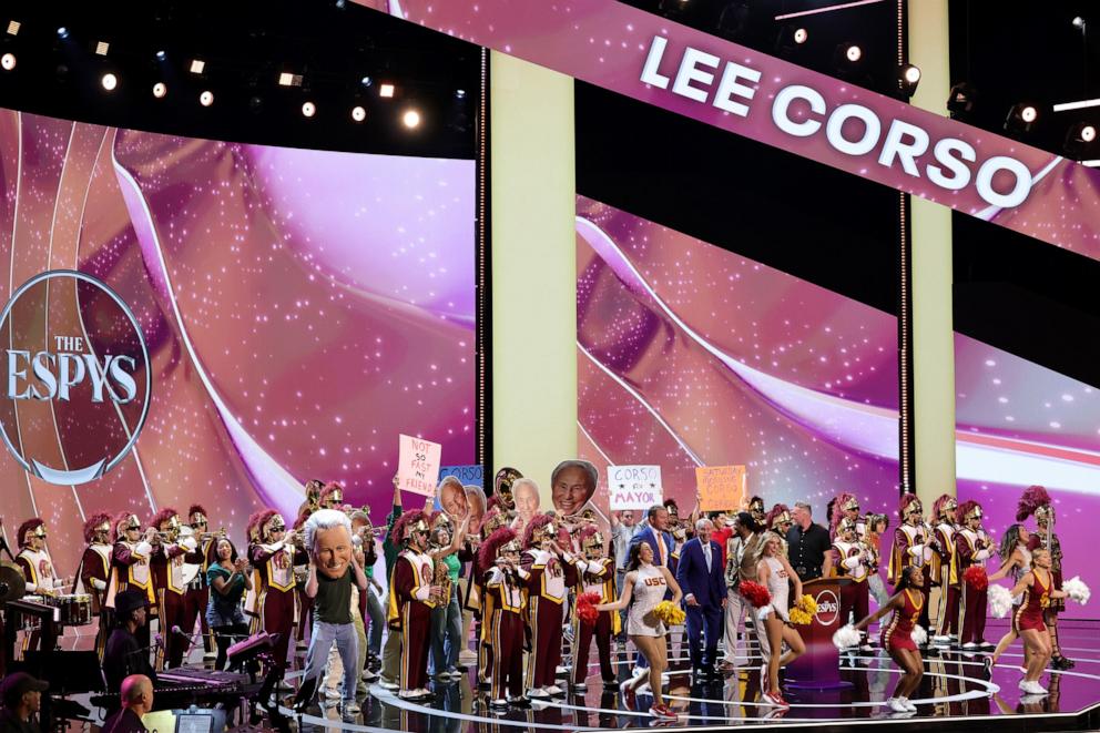 PHOTO: Kirk Herbstreit, Lee Corso, Desmond Howard and the Trojan Marching Band are seen onstage during the 2025 ESPY Awards at Dolby Theatre on July 16, 2025 in Hollywood, California.
