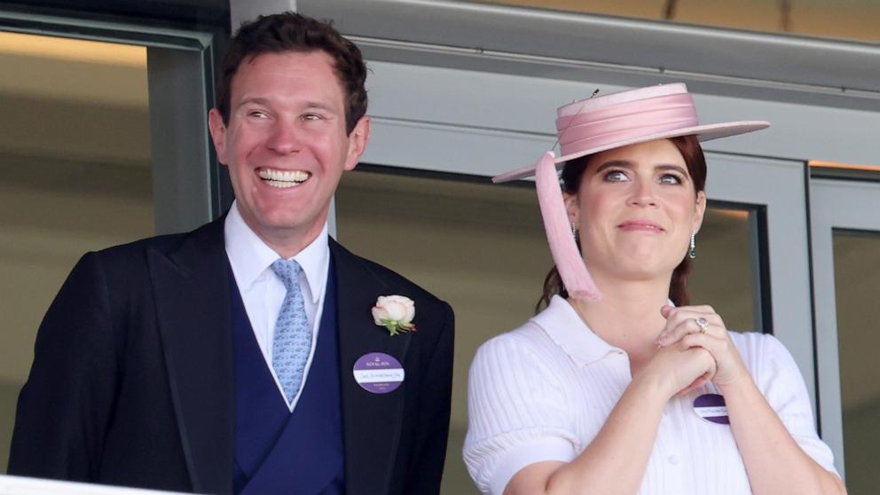 PHOTO: Jack Brooksbank and Princess Eugenie of York smile as they attend day two of Royal Ascot 2024 at Ascot Racecourse on June 19, 2024 in Ascot, England.