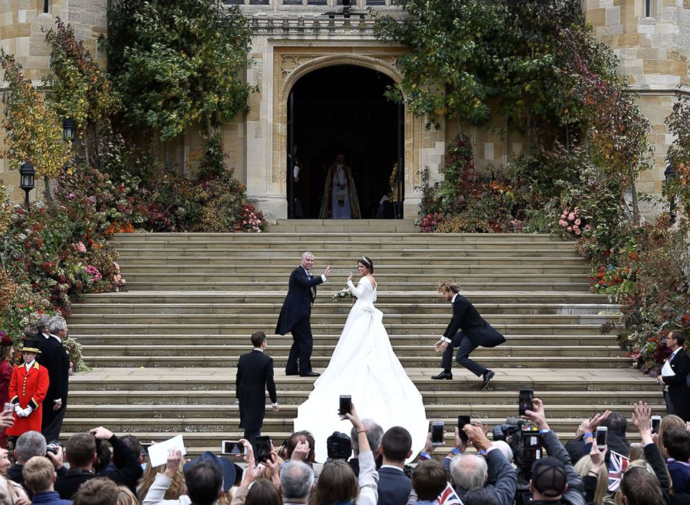 Princess Eugenie arrives accompanied by the Duke of York, at St George's Chapel for her wedding to Jack Brooksbank in Windsor Castle in London, Oct. 12, 2018.