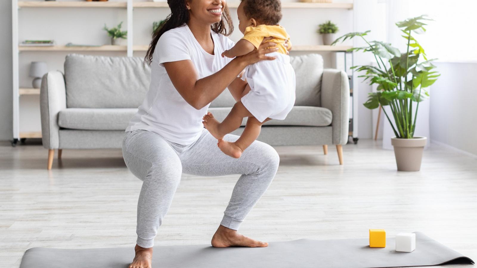 PHOTO: A woman exercises with her baby in this undated stock photo.