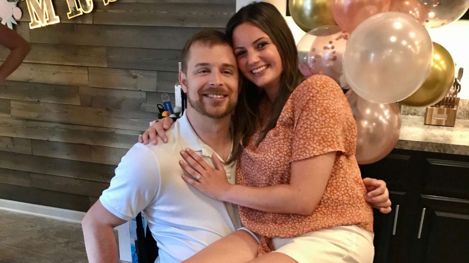 PHOTO: Josh Smith, who was paralyzed in an accident, used an exoskeleton suit to get down on one knee to propose to his girlfriend, Grace Thompson.