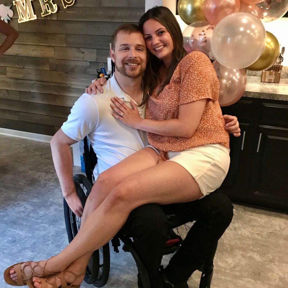VIDEO: Man paralyzed in accident uses exoskeleton suit to propose to his girlfriend 