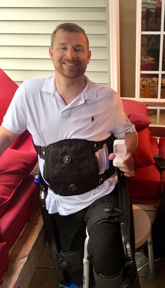 PHOTO: Josh Smith, who was paralyzed in an accident, used an exoskeleton suit to get down on one knee to propose to his girlfriend, Grace Thompson.